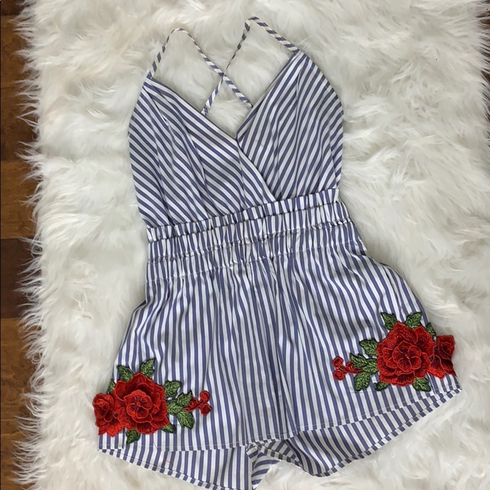 Blue white lined romper with flower detailing